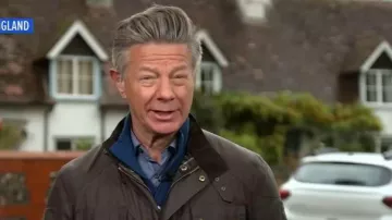 Belstaff Racemaster Funnel-Neck Waxed Cotton Jacket worn by Ian Pannell as seen in Good Morning America on October 20, 2025