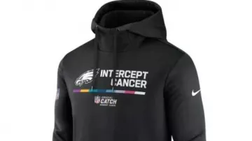 Philadelphia Eagles Crucial Catch Therma Performance Black Hoodie worn by Travis Kelce as seen in History Of The Philadelphia Eagles