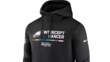 Philadelphia Eagles Crucial Catch Therma Performance Black Hoodie worn by Travis Kelce as seen in History Of The Philadelphia Eagles