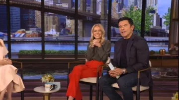 Saint Laurent Polka Dot Tie-Neck Button Down Silk Blouse worn by Kelly Ripa as seen in LIVE with Kelly and Mark on October 22, 2025