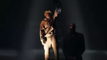 Keiser Clark Brown Carpenter Panel Hoodie worn by YBN Cordae in Cordae - Super [Official Music Video]