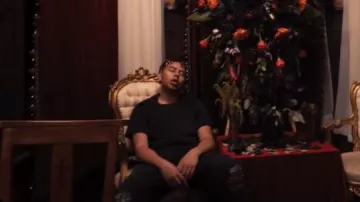 Amiri Black & Red Bandana MX1 Jeans worn by YBN Cordae in Cordae - Nightmares Are Real (feat. Pusha T) [Official Music Video]