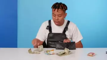 DR14 Black Leather Utility Chest Bag worn by YBN Cordae in 10 Things YBN Cordae Can't Live Without | GQ