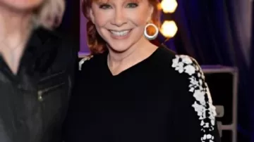 The Voice Black Embroidered Floral Sweater worn by (Reba McEntire) as seen in The Voice (S28)