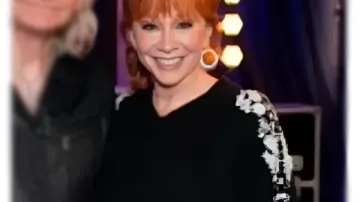 The Voice S28 Reba McEntire Floral Sweater worn by Reba McEntire as seen in The Voice