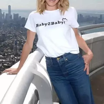 Baby2Baby White T-Shirt worn by Julie Bowen in Empire State