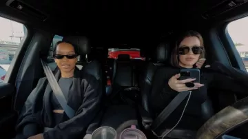 Saint Laurent SL 557 Shade oval sunglasses worn by Malika Haqq as seen in The Kardashians (S07E01)
