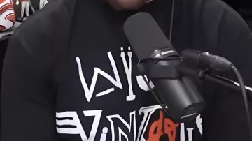 Black Graphic T-Shirt worn by Travis Kelce in Chiefs Shutout, BGs Back + Allen Iverson on Crossing Jordan, Philly Fans, Step Overs & More | EP 161