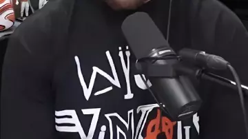 Black Graphic T-Shirt worn by Travis Kelce in Chiefs Shutout, BGs Back + Allen Iverson on Crossing Jordan, Philly Fans, Step Overs & More | EP 161