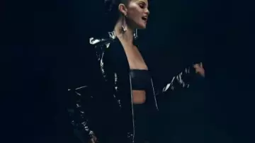 In The Dark Black Coat worn by Selena Gomez in Selena Gomez - In The Dark (Official Music Video)