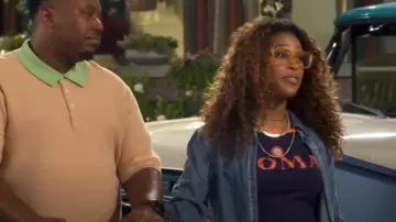 BDG Willow Roma Baby Tee worn by Courtney (Skye Townsend) as seen in The Neighborhood (S08E03)