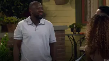 Scotch & Soda Terrycloth Contrast Detail Relaxed-Fit Polo worn by Malcolm Butler (Sheaun McKinney) as seen in The Neighborhood (S08E02)