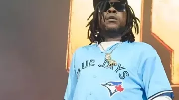 Vybz Kartel Scotiabank Arena 2025 Toronto Blue Jays Jersey in the music video Vybz Kartel Brings The Fire Light up Toronto OVO fest Send message To masicka