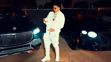 Hudson Jeans White Ripped Zack Jeans worn by DeeBaby in DeeBaby - Bank Statements & Deposits ( Official Video ) shot by : Cash Jundi