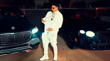 Purple Brand White Monogram Denim Jacket worn by DeeBaby in DeeBaby - Bank Statements & Deposits ( Official Video ) shot by : Cash Jundi