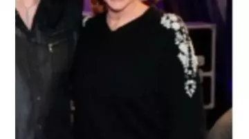 Black Floral Sweater worn by (Reba McEntire) as seen in The Voice (S28)