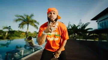 Louis Vuitton Orange LV Palm Tree Logo T Shirt worn by El Alfa in El Alfa "El Jefe" x Nfasis - ESTE (Video Oficial)