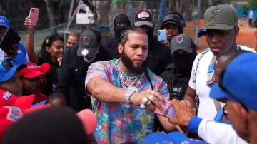 Givenchy x BSTROY Multicolor Stamp Print T Shirt worn by El Alfa in EL ALFA EL JEFE X ROCHY RD - LOS POBRES Y LOS RICOS