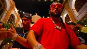 Louis Vuitton Red Staple Pin Logo T Shirt worn by El Alfa in EL ALFA "EL CAPO" ❌ NORIEL ❌ TRUENO - LOS APARATOS ✈️???? #SagitarioTheAlbum