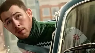 A Very Jonas Christmas Nick Jonas Green Sweater worn by Nick Jonas (Nick Jonas) as seen in A Very Jonas Christmas Movie