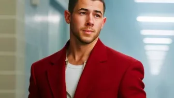 A Very Jonas Christmas Nick Jonas Red Blazer worn by Nick Jonas (Nick Jonas) as seen in A Very Jonas Christmas Movie