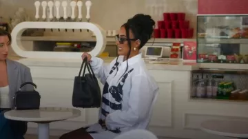 Hermes Birkin 30 Sac à main noir Epsom avec matériel en palladium porté par Bre Tiesi comme on le voit dans Selling Sunset (S09E06)