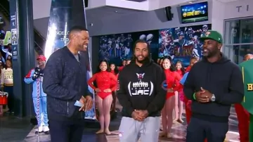 Veste en tricot jacquard en laine mélangée John Varvatos portée par Michael Strahan, vue dans Good Morning America le 30 octobre 2025