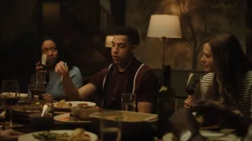 Polo boutonné à rayures Old Navy porté par Ofc. Jonah Silver (Marcus Scribner) vu dans Boston Blue (S01E02)
