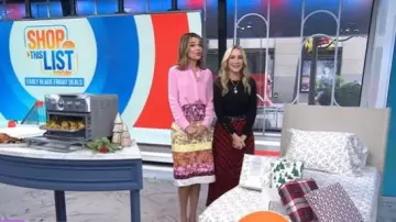 Woolrich x Target Buffalo Check Midi A-Line Pleated Skirt worn by Chassie Post as seen in Today on November 7, 2025