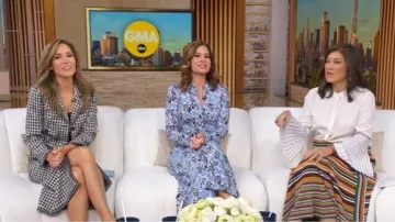 Me + Em Graphic Ribbon Floral Print Midi Dress worn by Rebecca Jarvis as seen in Good Morning America on November 7, 2025
