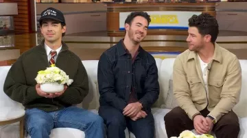 Jacquemus The Merino Zipped Cardigan Jacket worn by Joe Jonas as seen in Good Morning America on November 10, 2025