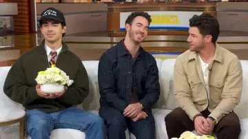 Jacquemus The Merino Zipped Cardigan Jacket worn by Joe Jonas as seen in Good Morning America on November 10, 2025