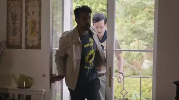 Atari Dragon Ball Z T-Shirt worn by Jay Arondekar (Utkarsh Ambudkar) as seen in Ghosts (S05E02)