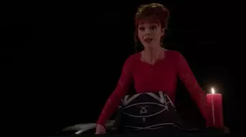 The red dress of Rowena MacLeod (Ruth Connell) in Supernatural S11E03