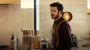 Beams Plus Knit Polo Stripe worn by Noah Roklov (Adam Brody) as seen in Nobody Wants This (S02E07)