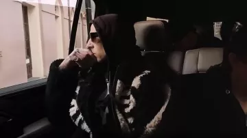 Kapital Bone Boa Reversible Printed Fleece and Nylon Jacket worn by Travis Barker as seen in The Kardashians (S07E03)