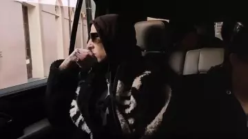 Kapital Bone Boa Reversible Printed Fleece and Nylon Jacket worn by Travis Barker as seen in The Kardashians (S07E03)