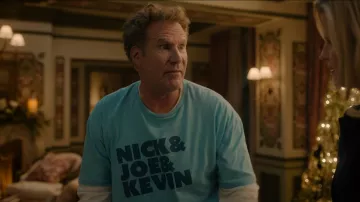 Camiseta azul de Nick, Joe & Kevin usada por (Will Ferrell) en una película navideña de Very Jonas