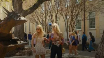 Simkhai Amelia Embellished Straight Jeans worn by Angela Norris (Ali Larter) as seen in Landman (S2E01)