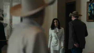 Bottega Veneta The Lauren 1980 Intrecciato Leather Clutch worn by Cami Miller (Demi Moore) as seen in Landman (S2E01)