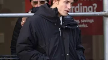 Here Comes Parka Coat worn by (Robert Pattinson) as seen in The Flood