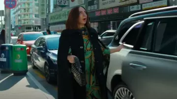 La DoubleJ Milano Cady Cape worn by Molly Novak (Maya Rudolph) as seen in Loot (S03E07)