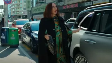 Valentino Garavani Medium Rockstud Spike Shoulder Bag worn by Molly Novak (Maya Rudolph) as seen in Loot (S03E07)
