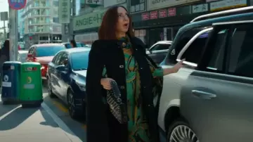 Valentino Garavani Medium Rockstud Spike Shoulder Bag worn by Molly Novak (Maya Rudolph) as seen in Loot (S03E07)