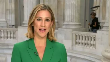 Tahari ASL Belted Pantsuit worn by Caitlin Huey-burns in CBS Mornings on November 19, 2025