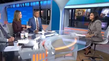 LK Bennett Laurie Pleated Faux Leather Midi Skirt worn by Laura Jarrett as seen in Today on November 19, 2025