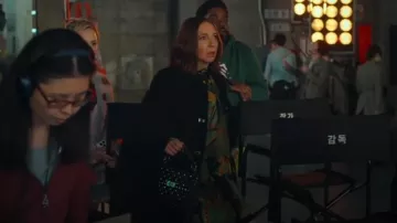 Valentino Medium Nappa Rockstud Spike Bag worn by Molly Novak (Maya Rudolph) as seen in Loot (S03E07)