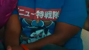 Graphic T-shirt worn by Howard (Ron Funches) in Loot