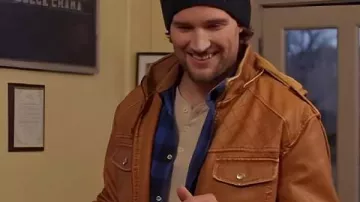 The Spirit of Christmas Station 2025 Chase Garland Brown Leather Jacket worn by Dane Woods (Chase Garland) in The Spirit of Christmas Station