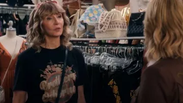 Kumurkumur American Country Music T-Shirt designed and sold worn by Mona Margadoff (Mary Steenburgen) as seen in A Man on the Inside (S02E05)